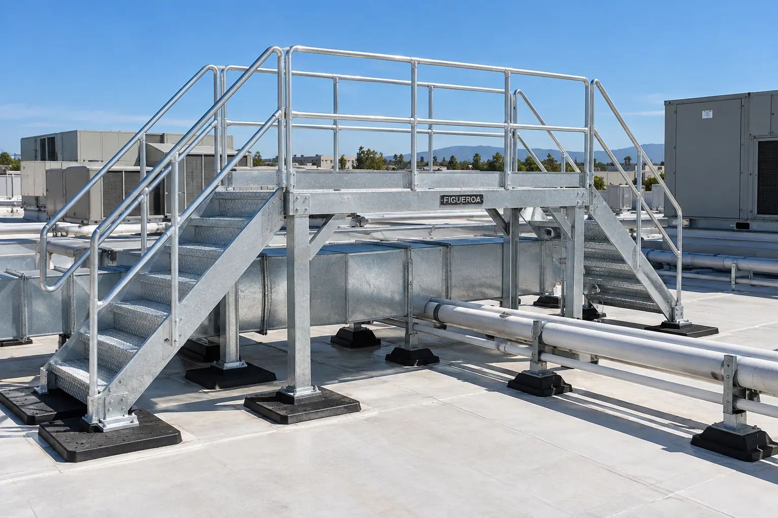 FIC rooftop aluminum crossover platform spanning HVAC ductwork and piping